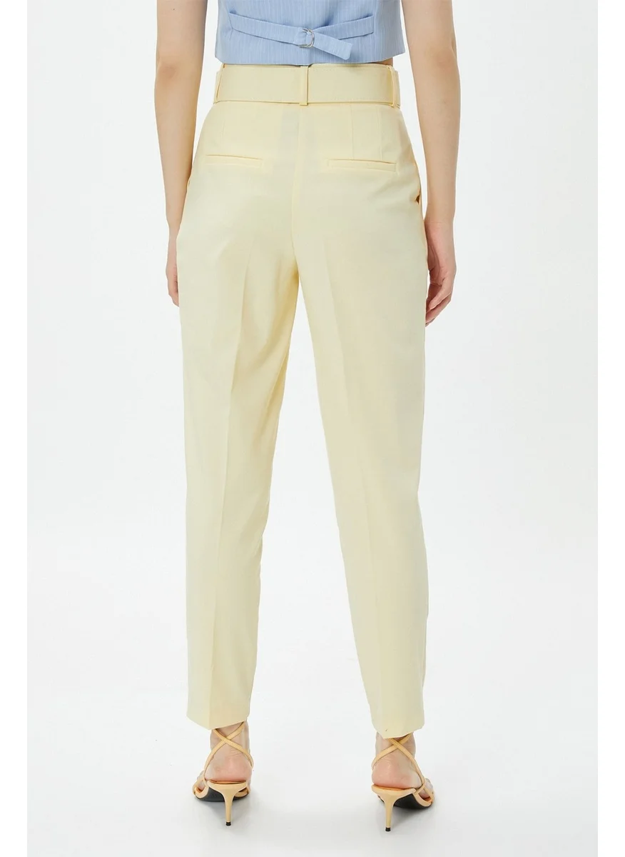 كوتون Women's Pocket Belted Slim Leg Carrot Trousers