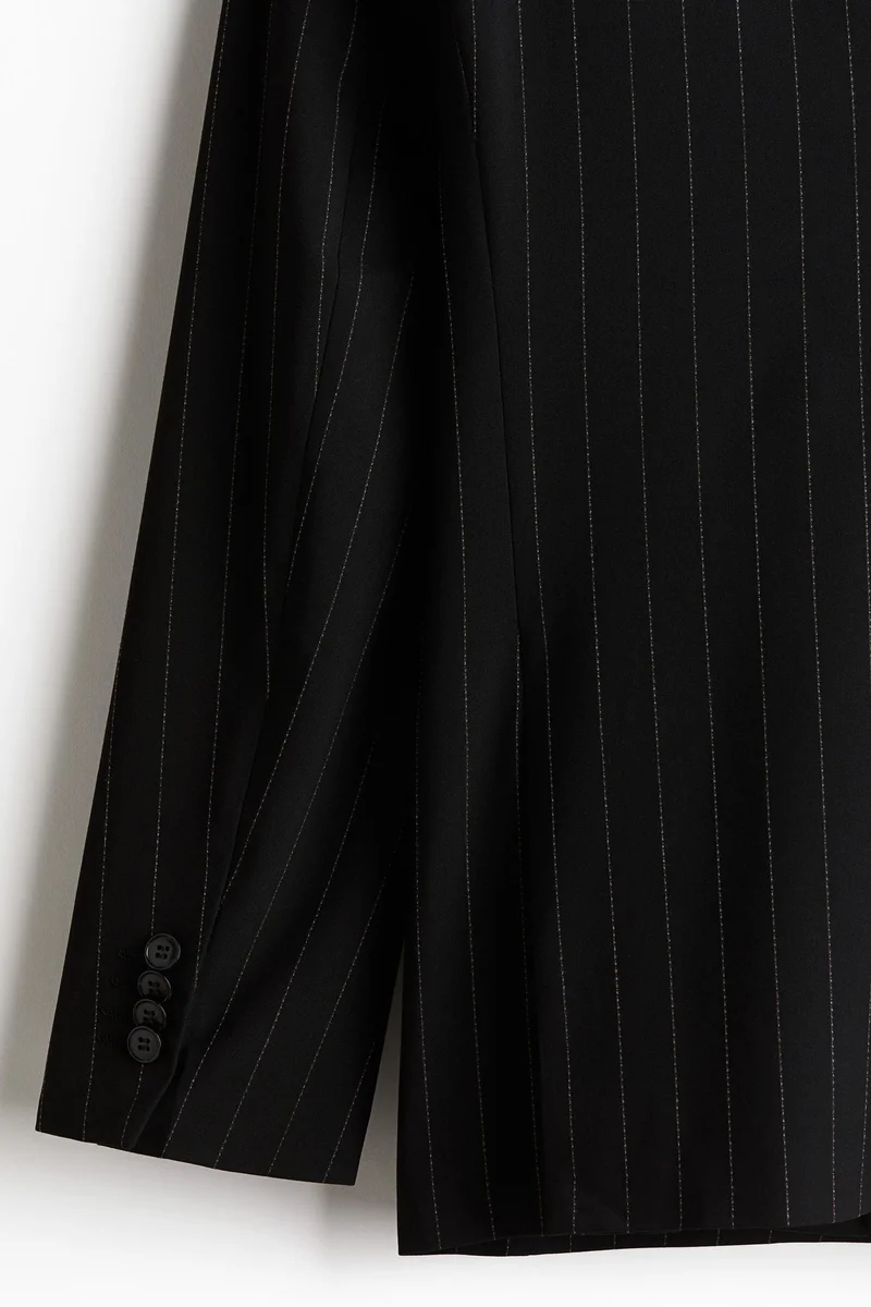 اتش اند ام جاكيت بأزرار مزدوجة وقصّة عادية