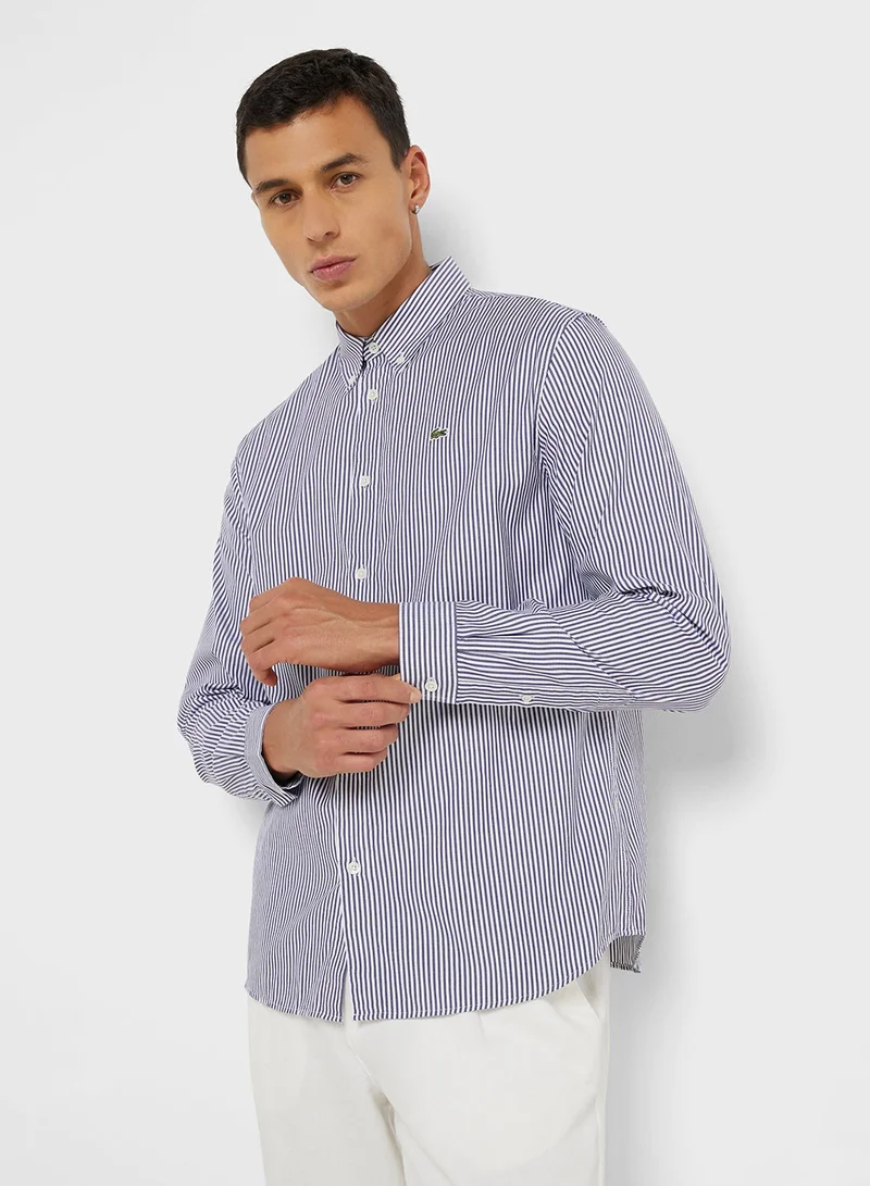 لاكوست قميص بطبعات خطوط