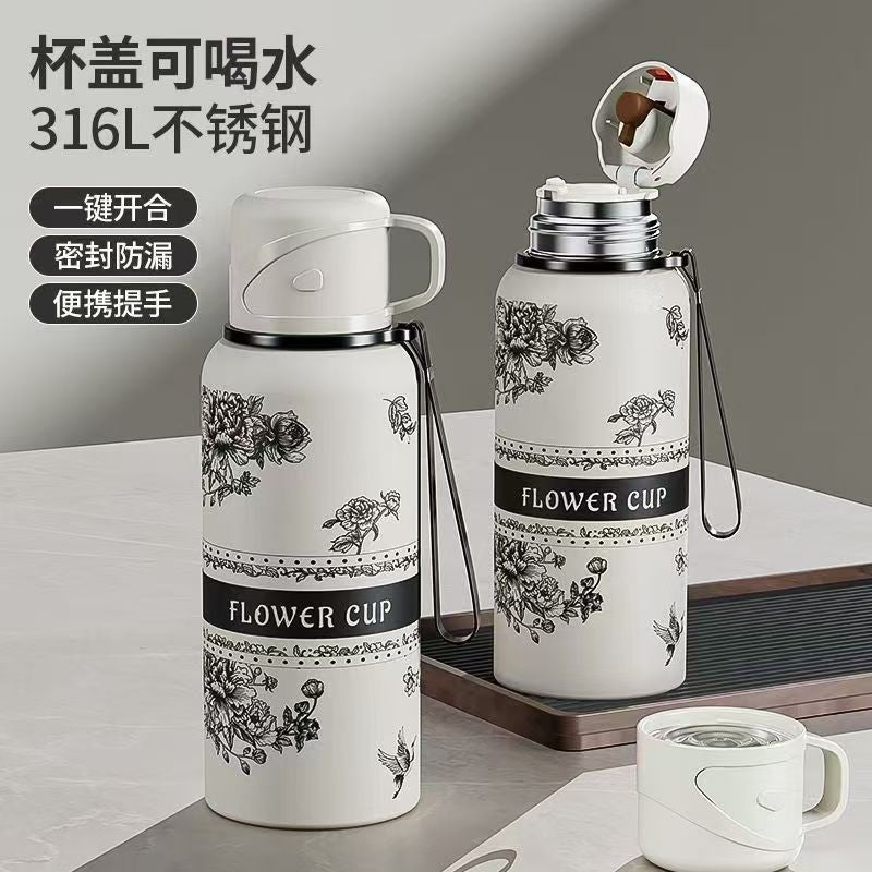 واي دي كوب أسود بغطاء مزدوج - زجاجة ماء معزولة من الفولاذ المقاوم للصدأ بتصميم أنيق، سعة كبيرة، محمولة للاستخدام الخارجي والرياضات - Image 2