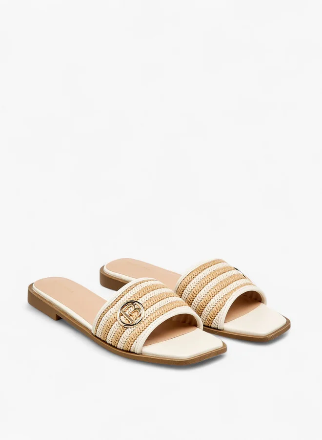 فلورا بيلا من شو إكسبرس Women's Textured Slip-On Flat Sandals with Metal Accent