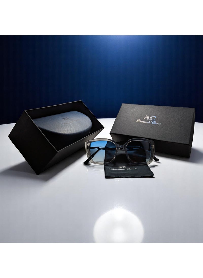 Armando Cavelli - Authentic Armando Cavelli sunglasses, crafted from carefully selected premium acetate for a luxurious look and longevity with extensive use. This model combines modernity and classic style, with a raw light grey transparent acetate front and mat blue -plated metal temples to complete your luxury look. Comes with premium polymer lenses offer UV400 protection in a gradient sky blue. - Image 1