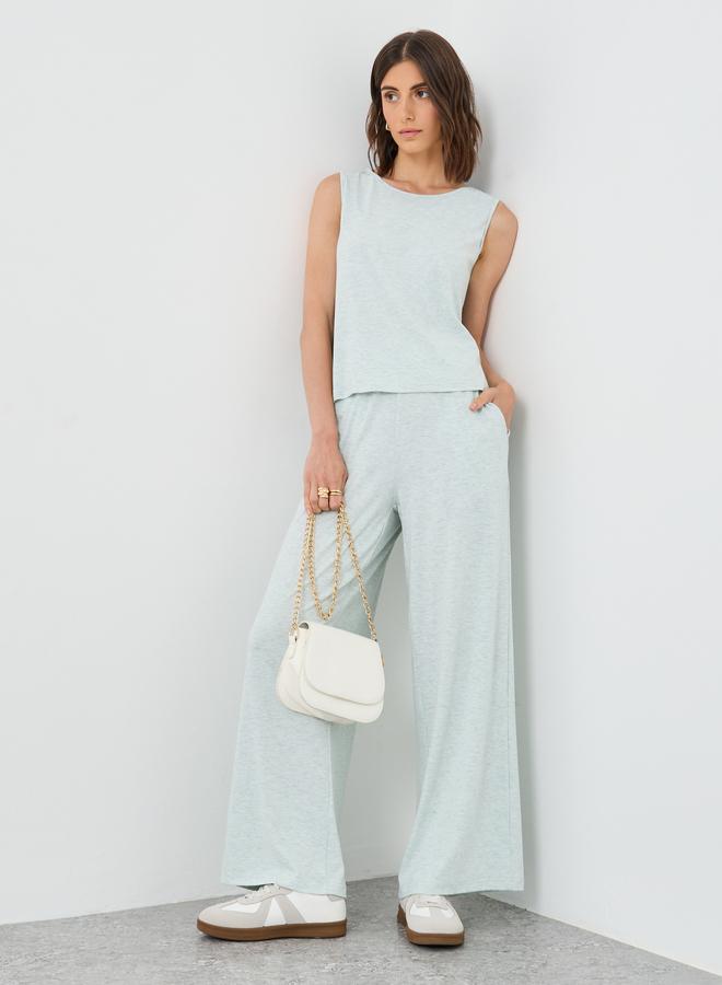 تايك تو طقم بلوزة بلا أكمام بنسيج الميلانج وبنطلون واسع الأرجل - Image 1