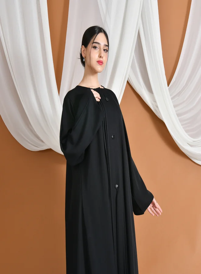 HAWRAA ABAYA Hiam Abaya | With soft pleated details and prominent buttons that add an elegant, classic touch