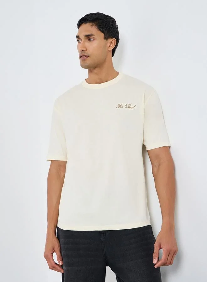 Styli Men Cream Embroidered Oversized T-Shirt