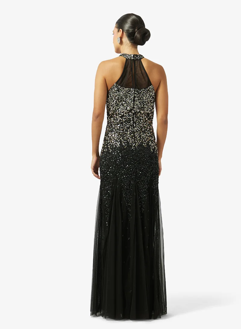 نمشي x فستان بياقة هالتر مزين