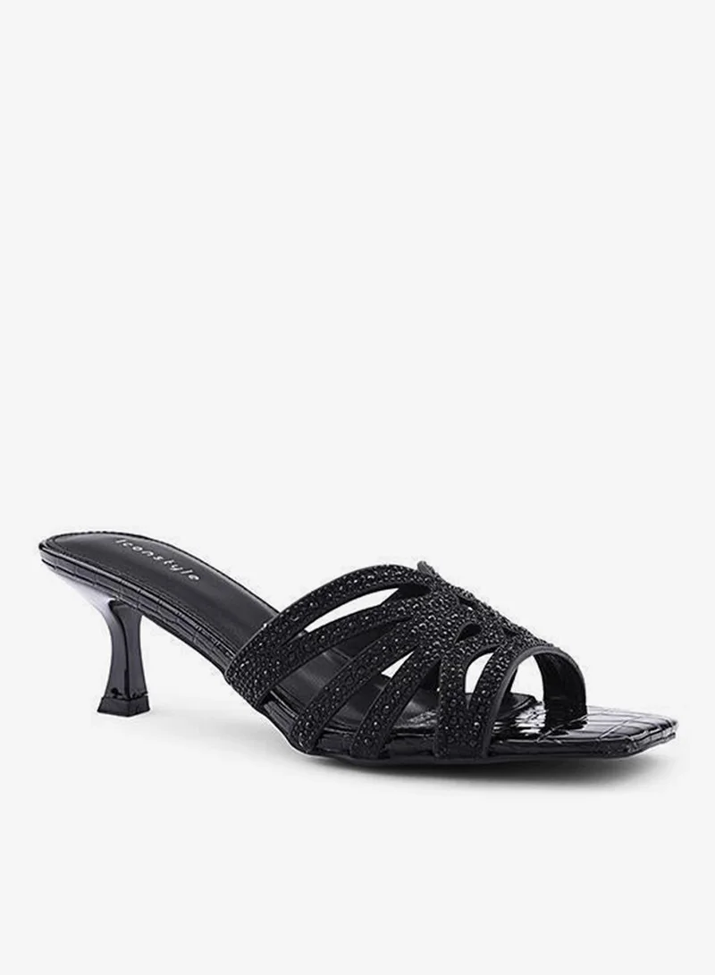 أيقون صنادل بكعب مزينة بأشرطة