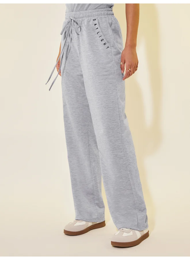تايك تو Take Two Letter Embroidered Drawstring Waist Wide Leg Pants