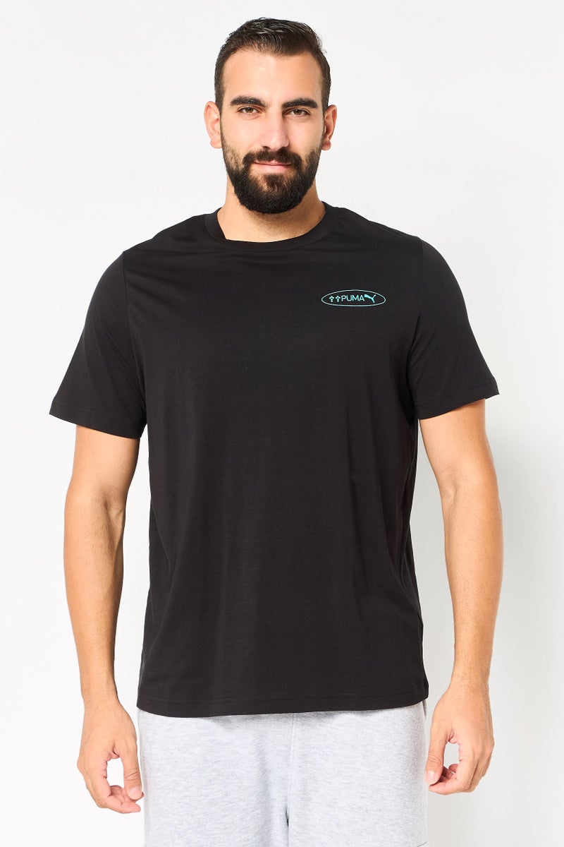 PUMA Men Sportswear Fit Short Sleeve Outdoor T-Shirt, Black - Image 1