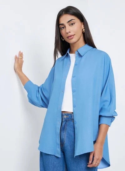 ستايلي بلوزة واسعة بشريط أزرار