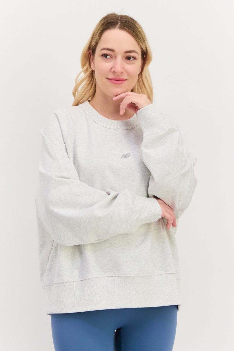 New Balance Women Sportswear Fit Long Sleeve Training Sweatshirt, Beige  - Image 1
