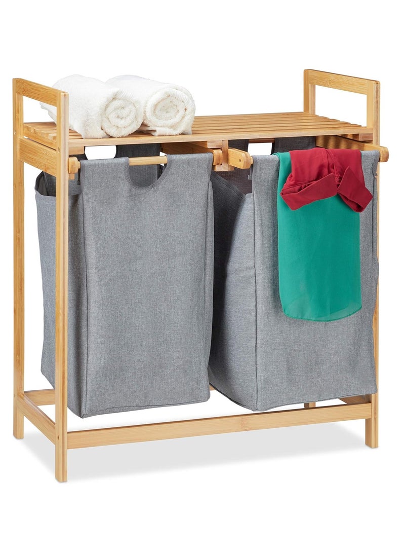 شو وو سلة غسيل مزدوجة قائمة بذاتها من الخيزران، بقسمين، مع أكياس تخزين قابلة للإزالة، وسلة مزدوجة موفرة للمساحة مع مقابض للملابس والبياضات. - Image 1