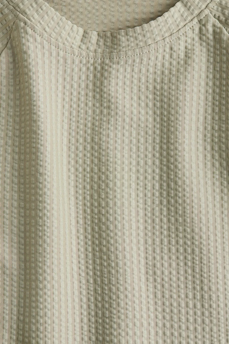 H&M UPF 50 textured swim top