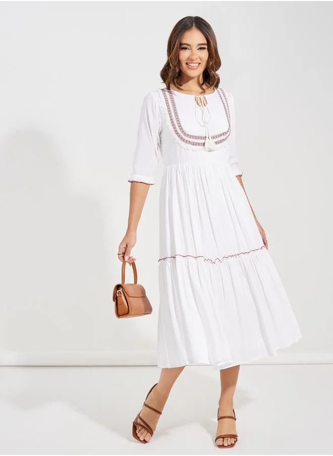 Styli Embroidered Panel Tie-Up Neck Midi Dress