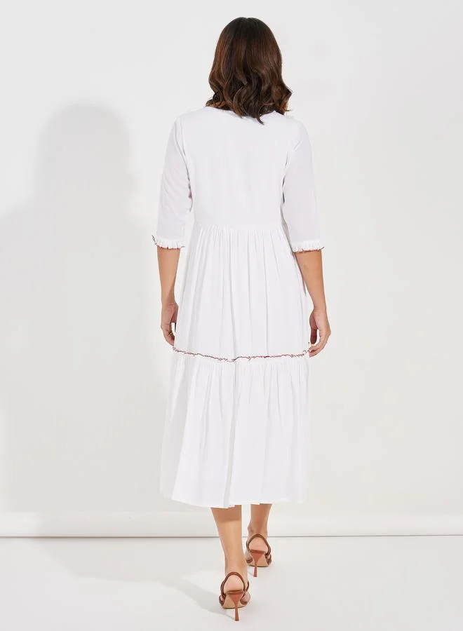 ستايلي Embroidered Panel Tie-Up Neck Midi Dress