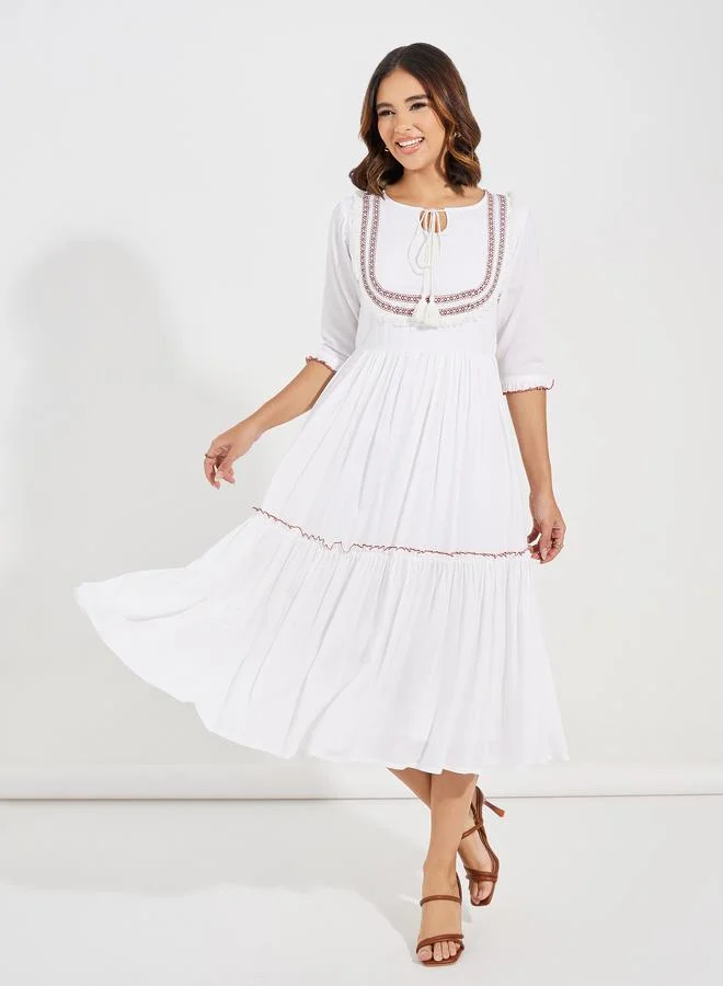 ستايلي Embroidered Panel Tie-Up Neck Midi Dress