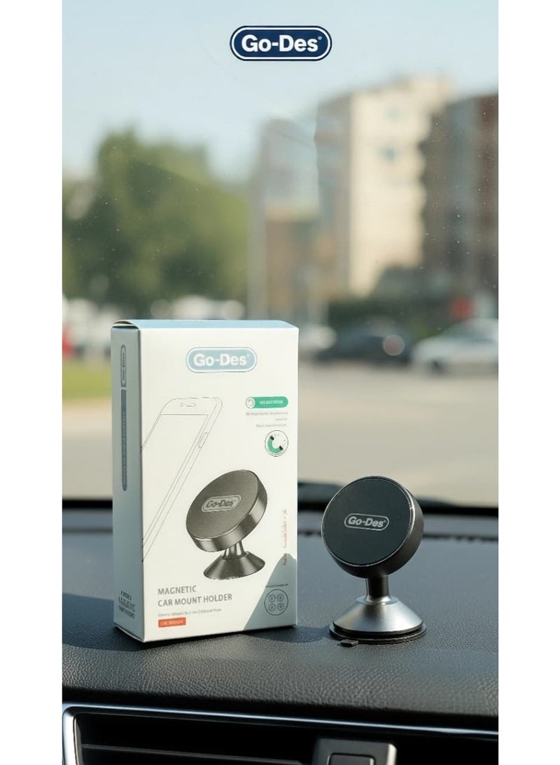 جو-ديز Compact magnetic car phone holder , Dashboard phone mount base , Mini car phone mount , 360 degree rotation phone holder for multiple viewing angles , Equipped with 4 magnets for secure attachment , Car phone holder with high-stability 3M adhesive , Compatible with smartphones , Compact design that saves space , Supports horizontal and vertical phone modes , Closed magnetic field does not affect phone signal , Easy to install and use , Base designed for enhanced stability , Phone holder with metal plate for direct attachment or behind the cover , Suitable for safe driving and answering calls , Vibration resistant on rough roads , Practical solution for mounting phones inside the car cabin , Small magnetic holder for mobile phones , Anti-slip car phone base , Interior car accessory for phone organization , Stable magnetic phone stand , One-touch secure phone mounting , Car accessories for mounting smartphones - Black Color - Image 1