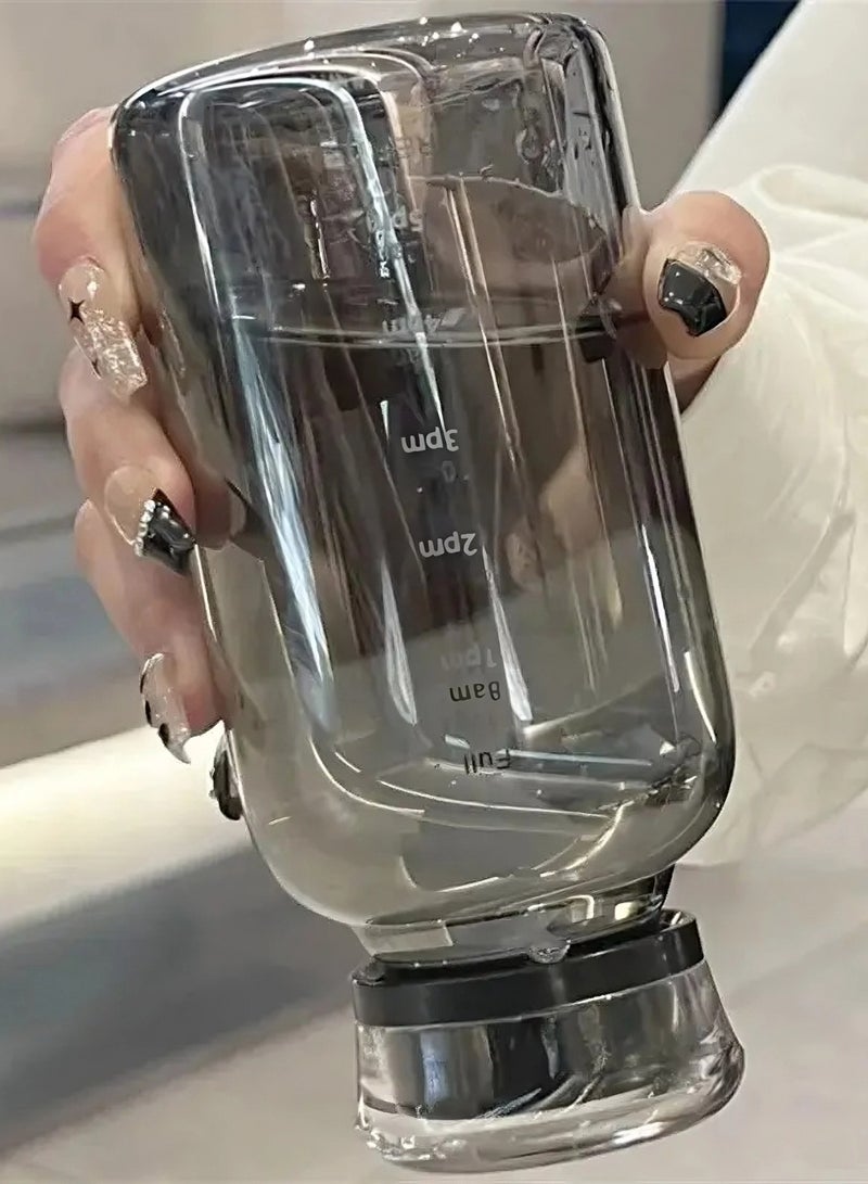 اوقورا زجاجة ماء شفافة سوداء بسعة 550 مل: محمولة، تصميم لطيف مع ميزات السيرو، المقبض، الغلاف السيليكوني، علامة الوقت، والمقياس. كوب عصير جمالي وإبداعي. - Image 2