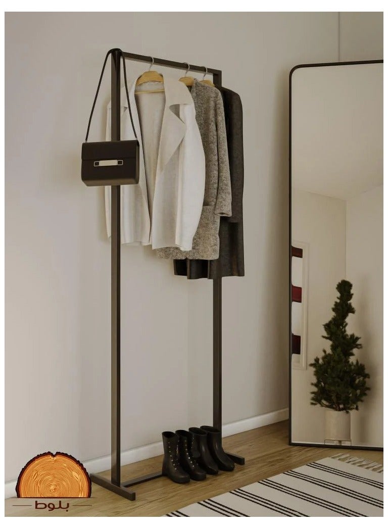 Modern freestanding metal coat rack, ideal for the bedroom, living room, office, and dining room. Easy to clean, stylish, and durable, in black.