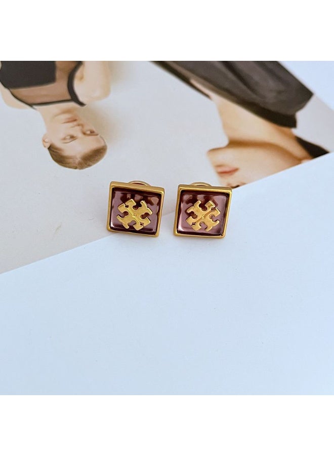TB Tory Burch Women's Lacquered Raised Logo Stud Earrings - Image 1