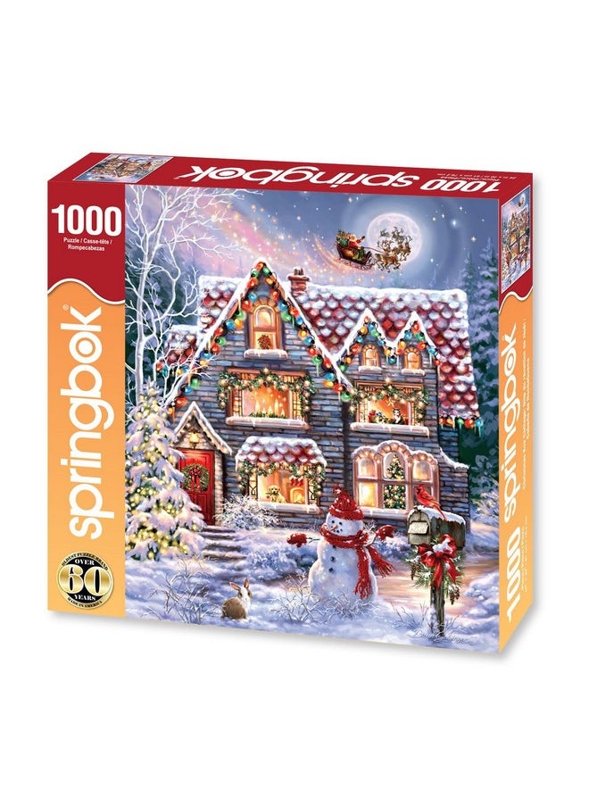 سبرينغبوك لغز الصور المقطوعة المكون من 1000 قطعة من Springbok's Christmas Eve Cottage هو صورة كلاسيكية لكوخ عيد الميلاد المريح مع رجل ثلج وسانتا يبحران في زلاجته أعلاه  - Image 2