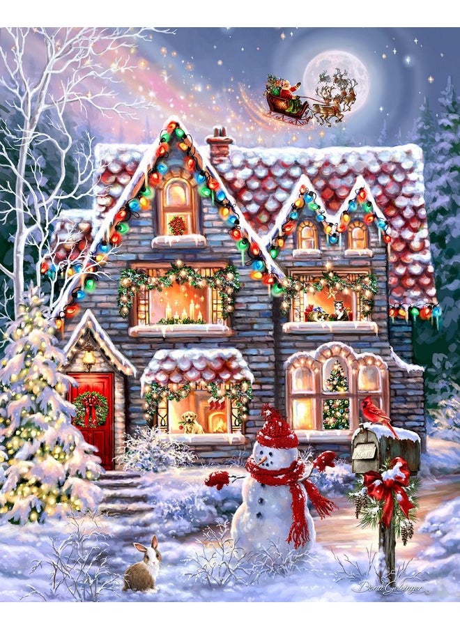 سبرينغبوك لغز الصور المقطوعة المكون من 1000 قطعة من Springbok's Christmas Eve Cottage هو صورة كلاسيكية لكوخ عيد الميلاد المريح مع رجل ثلج وسانتا يبحران في زلاجته أعلاه  - Image 1
