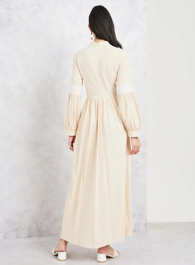 Styli Lace Detail Sleeves High Neck A-Line Maxi Dress