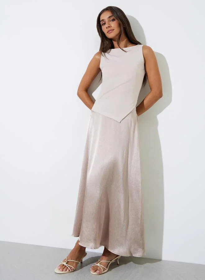 ستايلي Cream Sleeveless Asymmetric Hem Fitted Knit Top