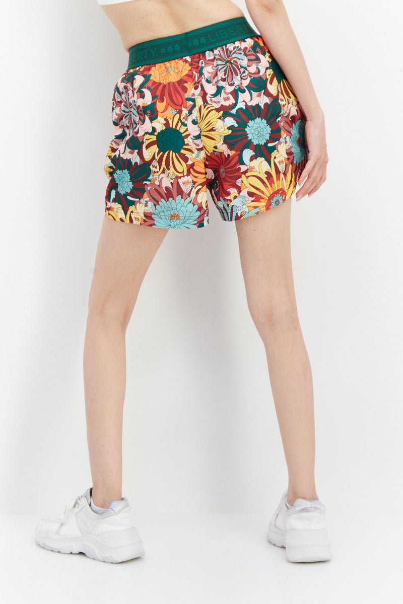 PUMA Women Sportswear Fit Floral Pattern Training Shorts, Green - Image 4