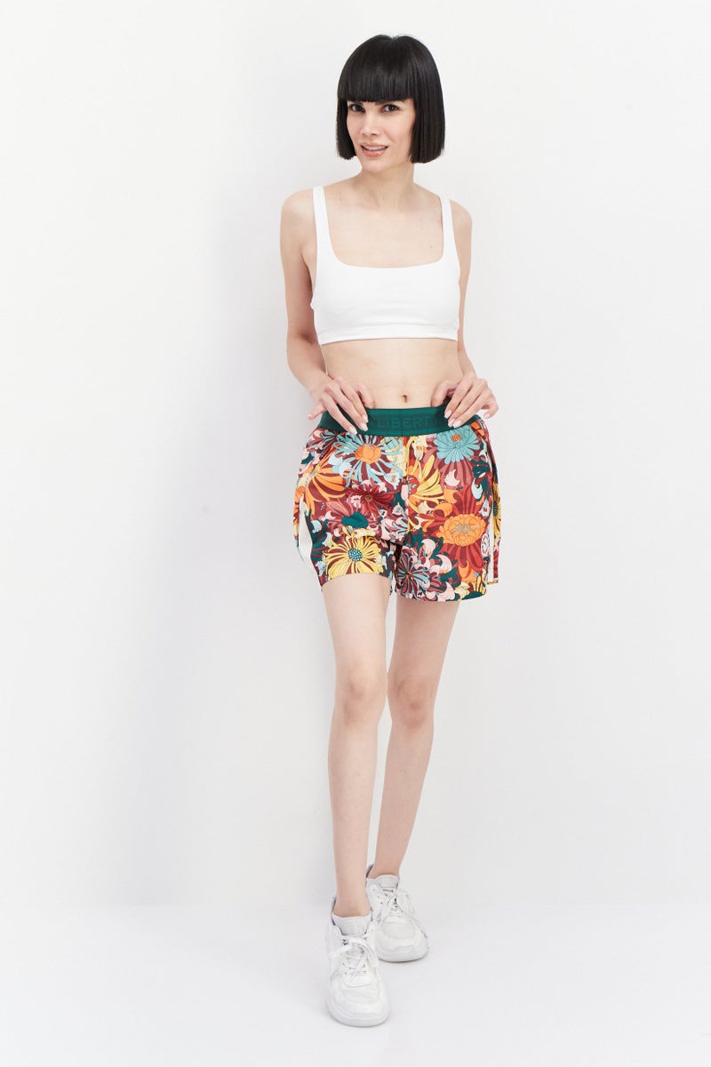 PUMA Women Sportswear Fit Floral Pattern Training Shorts, Green - Image 3
