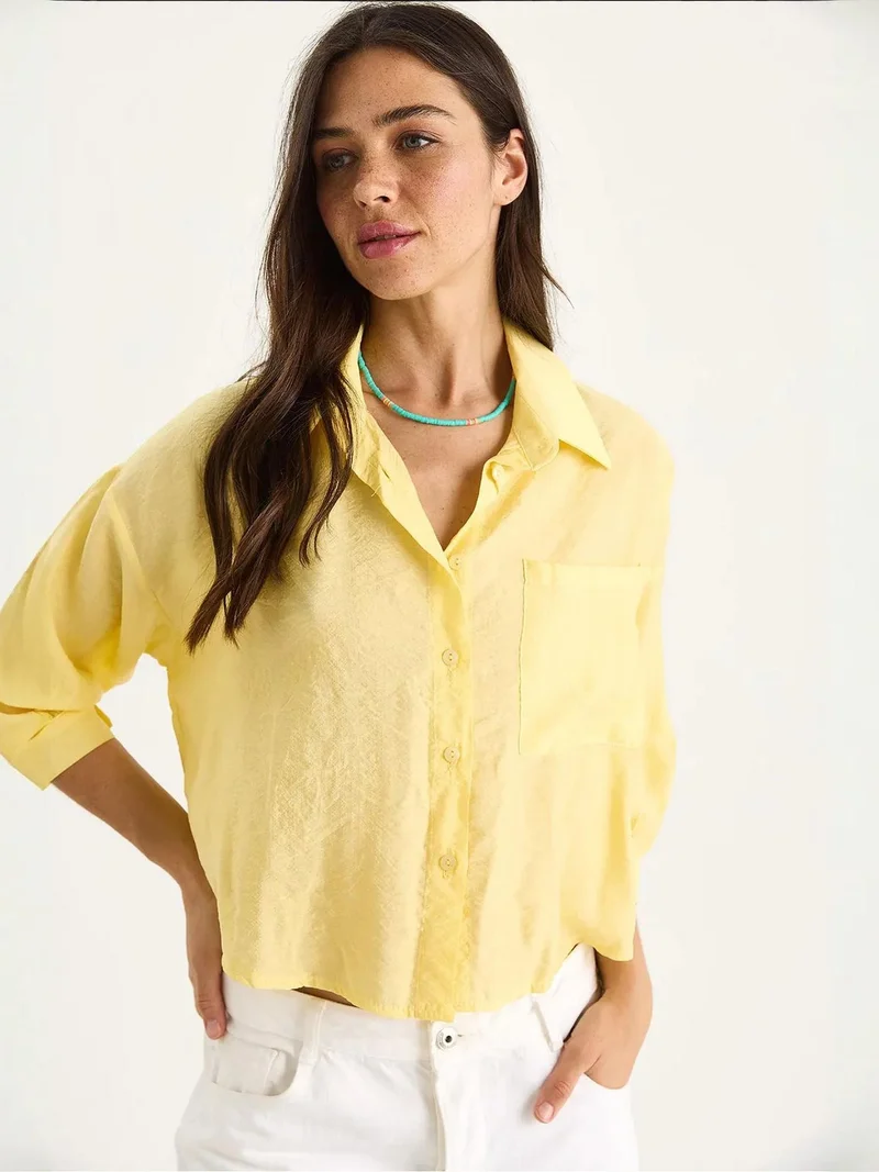Bianco Lucci LUCCI Textured Crop Shirt with Button Closure and Pocket