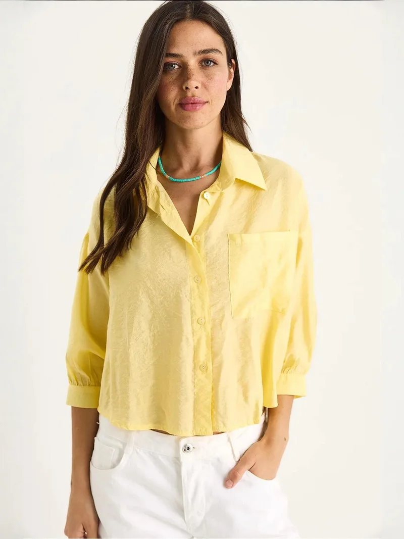 Bianco Lucci LUCCI Textured Crop Shirt with Button Closure and Pocket