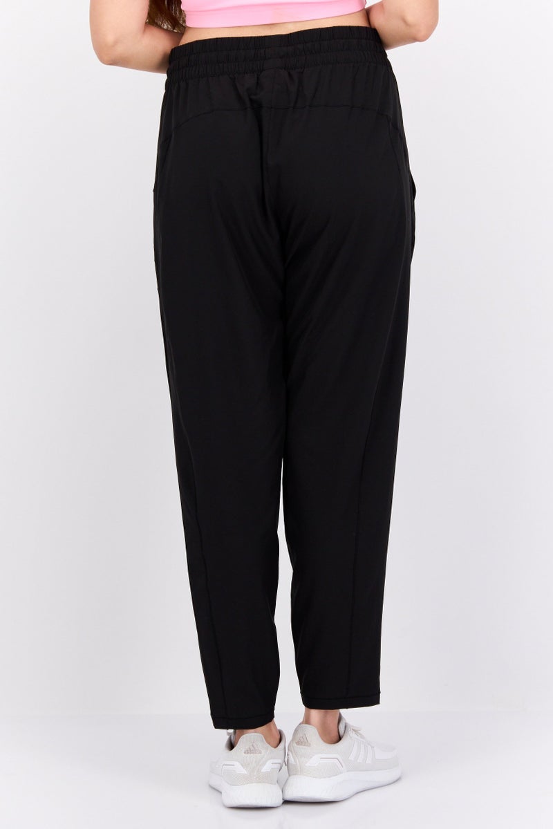 PUMA Women Sportswear Fit Solid Outdoor Track Pants, Black  - Image 3