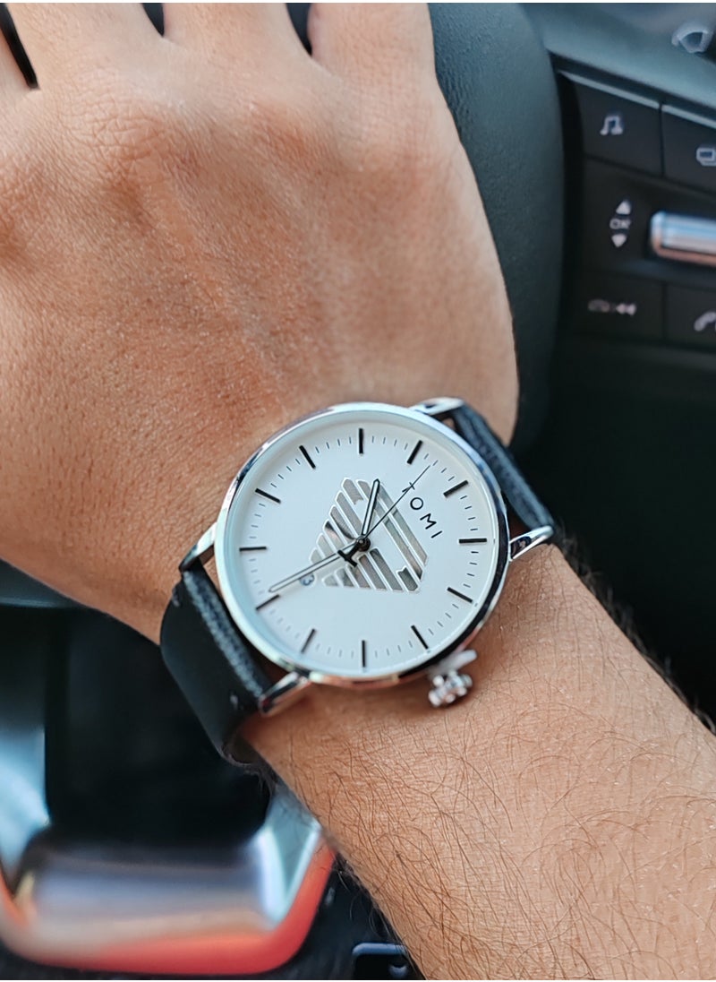 TOMI - TOMI Watch With a Black Leather Strap With Analog Dials For Both Men And Women, In Addition To Displaying The Date On a Daily Basis - Image 1