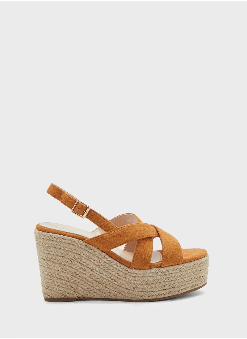 ايلا Ankle Strap Wedge Sandal