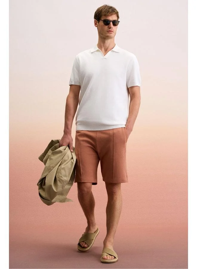 GRIMELANGE MATSEN Men's Waistband Elastic Side and Back Pocket Relaxed Tile-Color Shorts.