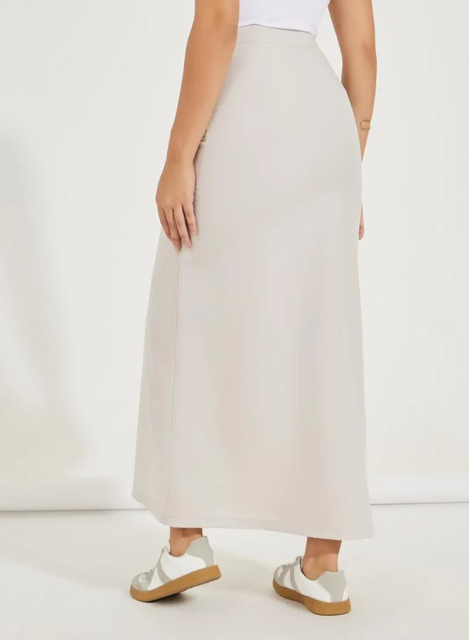 Styli Solid Maxi Skirt with Front Slit & Pockets