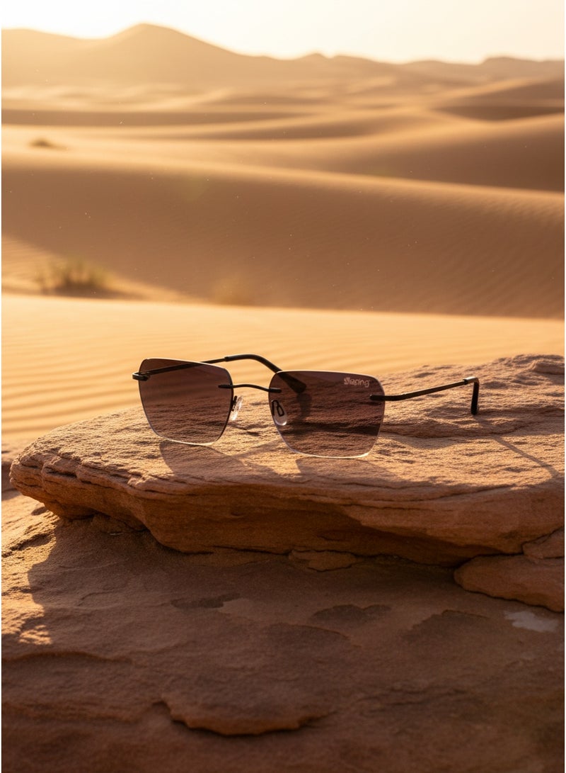 ابينغ ‍‍نظارة شمسية بتصميم عصري من ماركة (aping) بدون إطار (Rimless) بعدسات مربعة أنيقة بلون رمادي متدرج (Gradient) تعطي مظهر فاخر وجذاب. الإطار مصنوع من معدن خفيف باللون الأسود مع ذراع رفيعة لراحة الاستخدام طوال اليوم.  مزودة بأنف سيليكون مريح وقابل للتعديل لثبات مثالي على الوجه. العدسات توفر حماية من أشعة الشمس مع وضوح عالي للرؤية.  تصميم مناسب للرجال والنساء ويكمل الإطلالات الكاجوال والرسمية. - Image 3