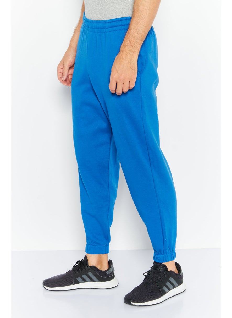 Asos Design - Men Oversized Solid Drawstring Jogger Pants, Blue - Image 1
