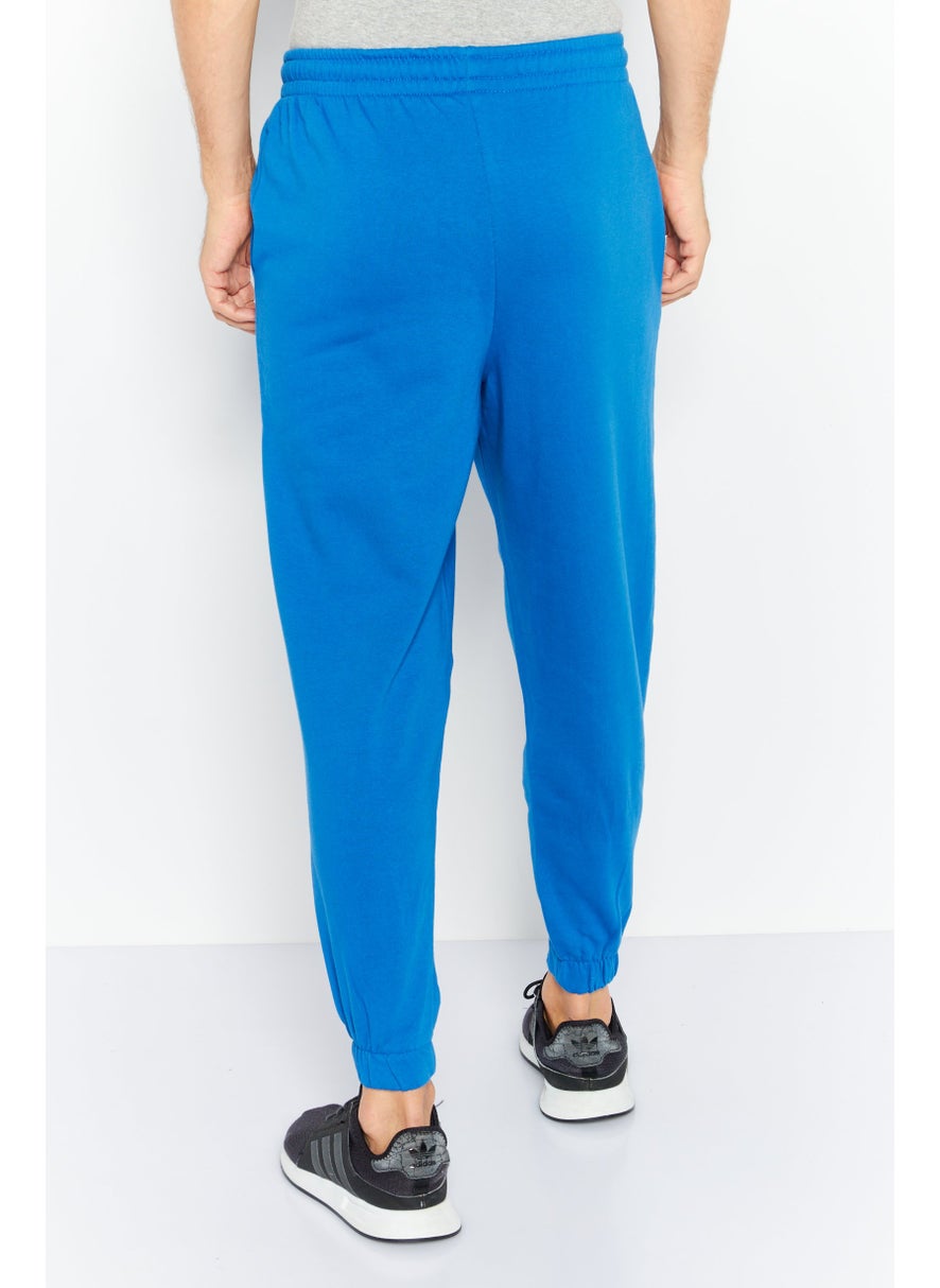 Asos Design - Men Oversized Solid Drawstring Jogger Pants, Blue - Image 1