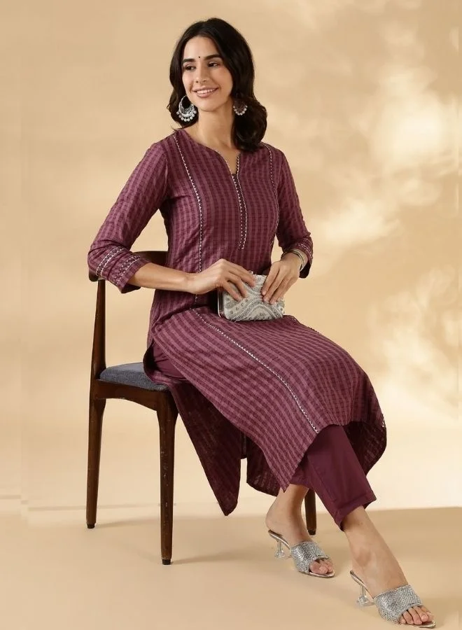 Abhishti Textured kurta with delicate lace detail on the neck, shoulder princess and sleeves with solid pant