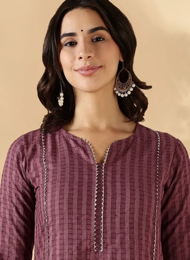 Abhishti Textured kurta with delicate lace detail on the neck, shoulder princess and sleeves with solid pant