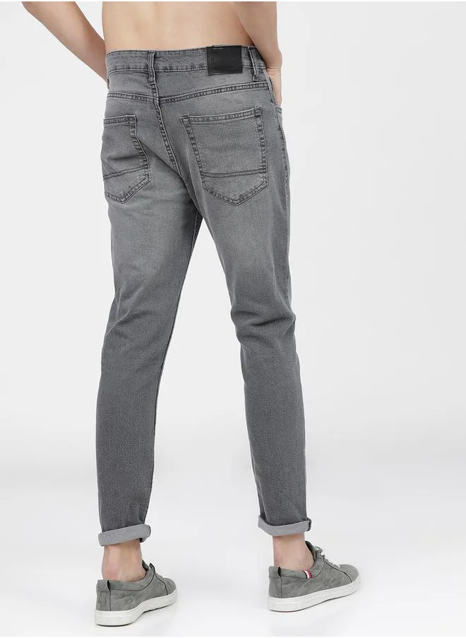 هاي لاندر Tapered Fit Heavy Fade Stretchable Jeans by Styli