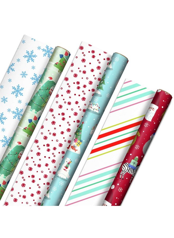 Hallmark Hallmark Trendy Reversible Christmas Wrapping Paper for Kids (3 Rolls: 120 sq. ft. ttl) Dinosaurs, Koalas, Polar Bears, Penguins, Camels, Zebras, Stripes  - Image 1