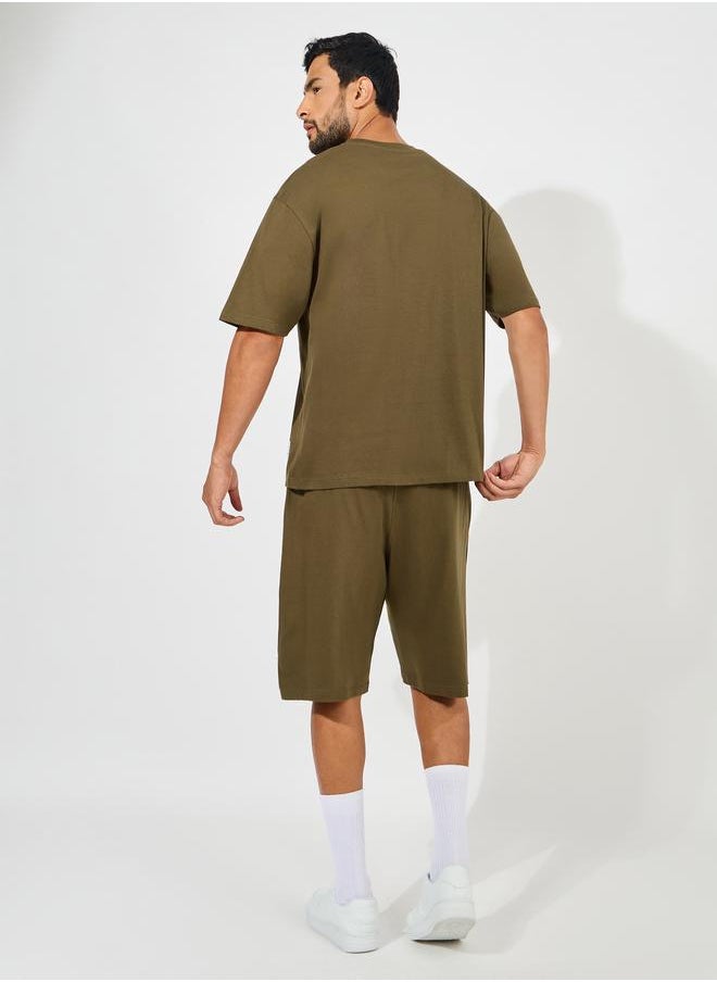 Styli Chest Print Heavy Cotton Jersey T-Shirt & Badge Detail shorts Co-Ords  - Image 4