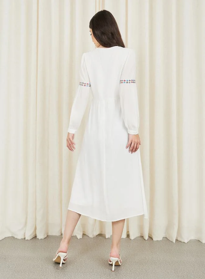 Styli Embroidered Tie Up Neck A-Line Midi Dress