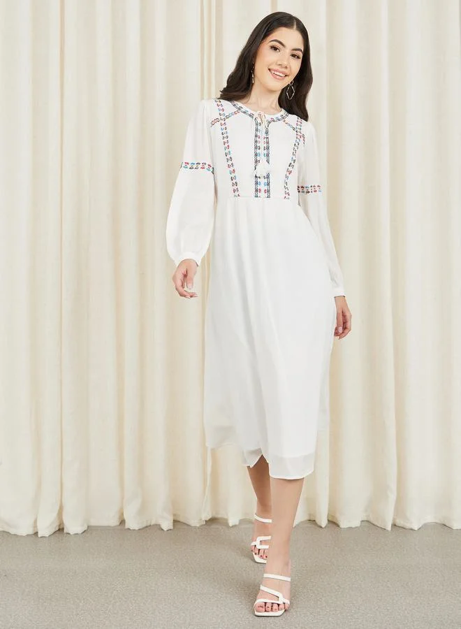 Styli Embroidered Tie Up Neck A-Line Midi Dress