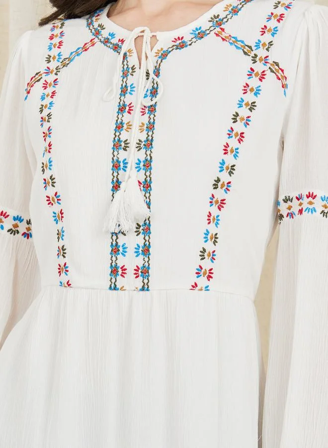 Styli Embroidered Tie Up Neck A-Line Midi Dress