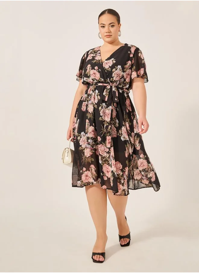 Styli Plus Size Floral Print Flared Sleeves Wrap Midi Dress