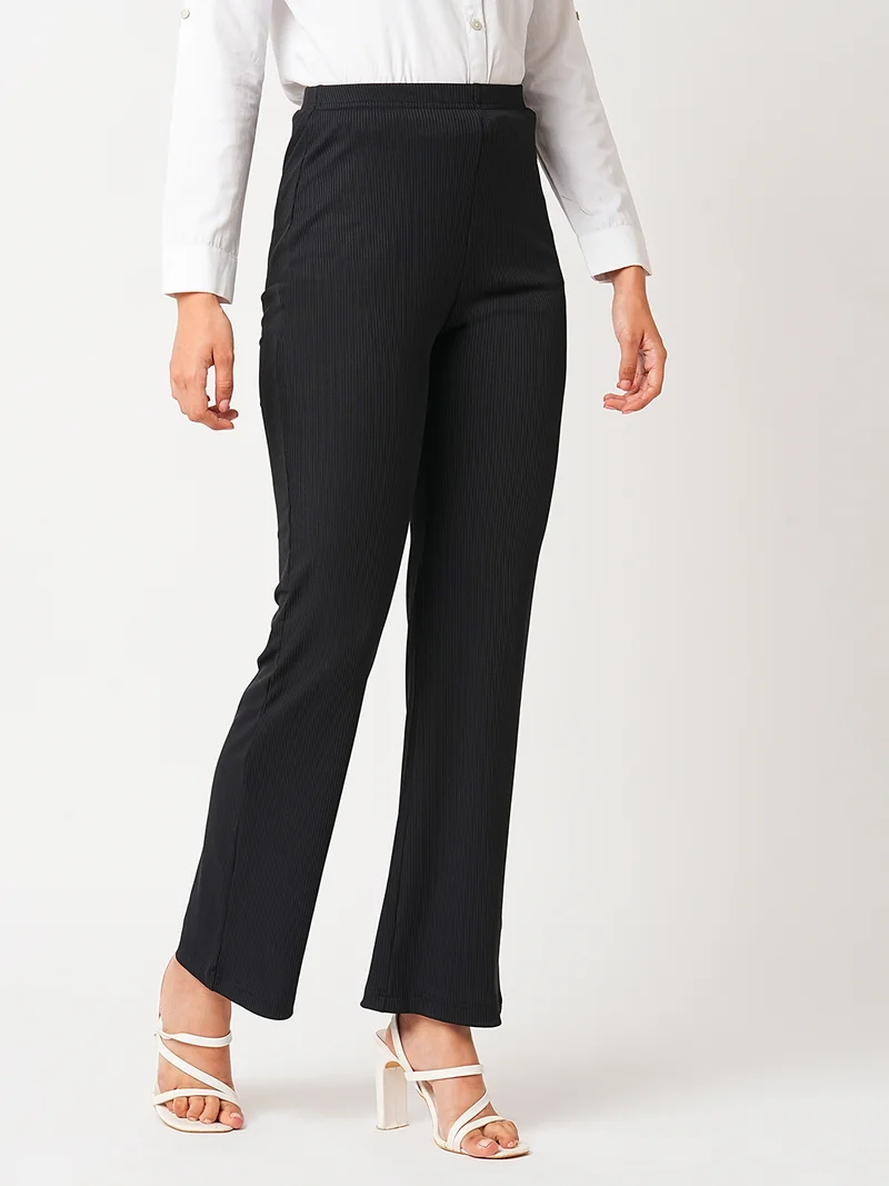 globus Women Black Self Design Mid-Rise Slim Fit Bootcut Stretchable Treggings